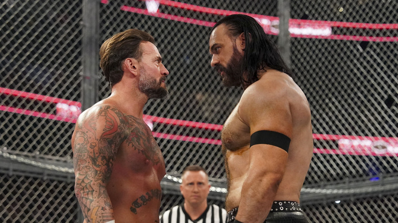 CM Punk and Drew McIntyre face off during Bad Blood at State Farm Arena on October 5, 2024 in Atlanta, Georgia.