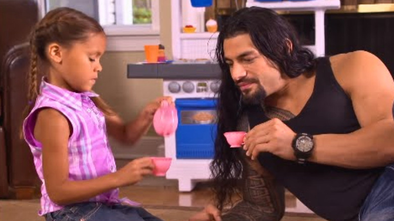Roman Reigns and daughter JoJo enjoying tea