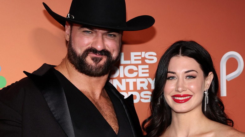 Drew McIntyre and Kaitlyn Frohnapfel attend the 2023 People's Choice Country Awards at The Grand Ole Opry on September 28, 2023 in Nashville, Tennessee.