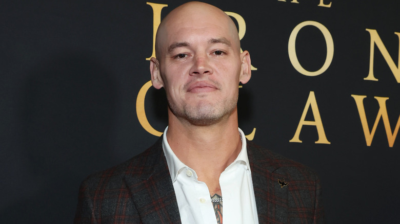 Baron Corbin wearing a suit