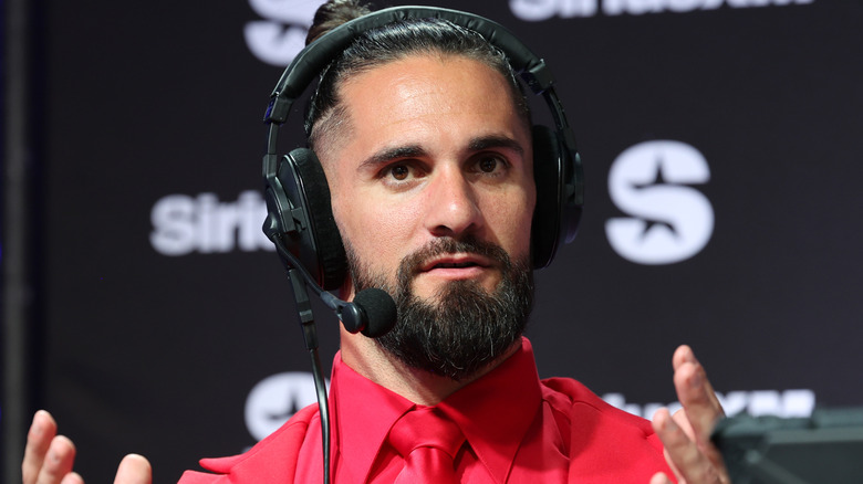 Seth Rollins wearing a headset