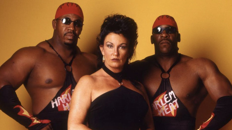 Harlem Heat posing with Sherri Martel