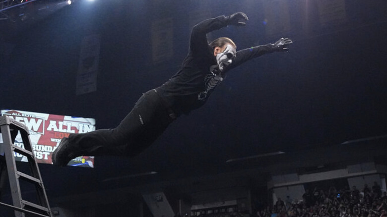 Sting jumping out of the ring