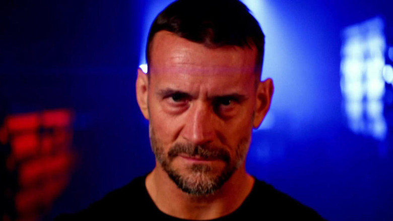 CM Punk staring