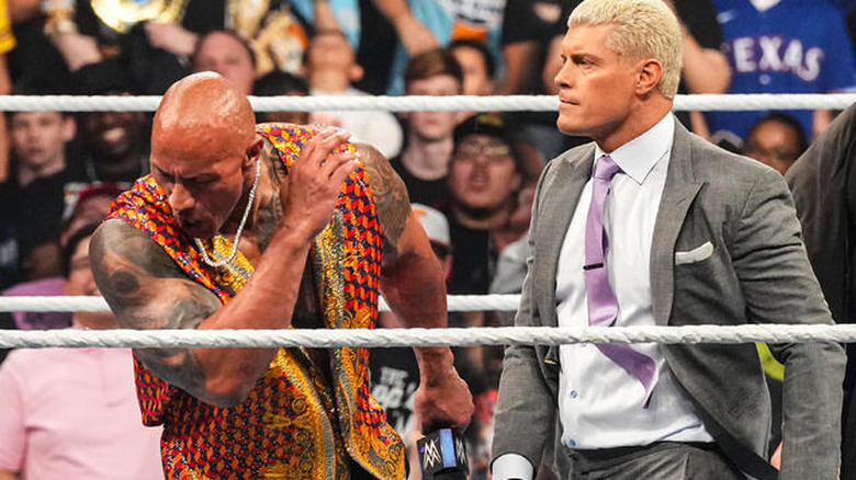 Cody Rhodes slapping Dwayne "The Rock" Johnson