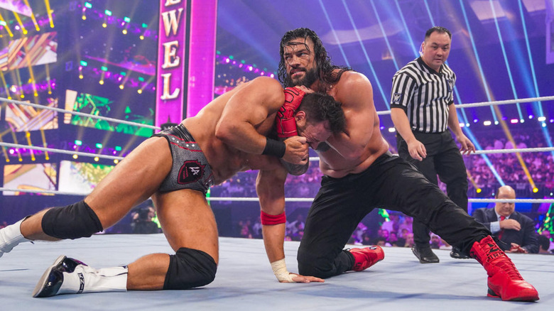 LA Knight and Roman Reigns at Crown Jewel