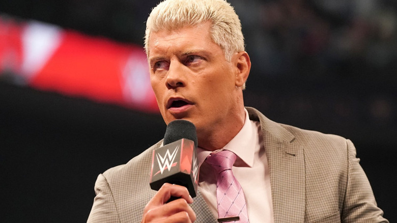 Cody Rhodes talking into microphone