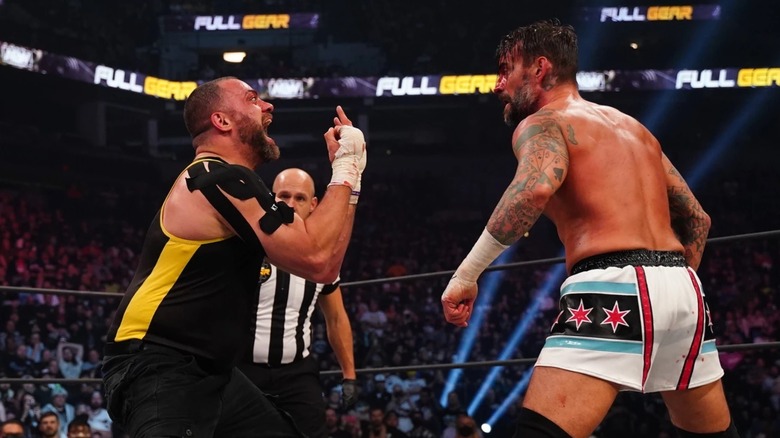 Eddie Kingston flips off CM Punk during a match