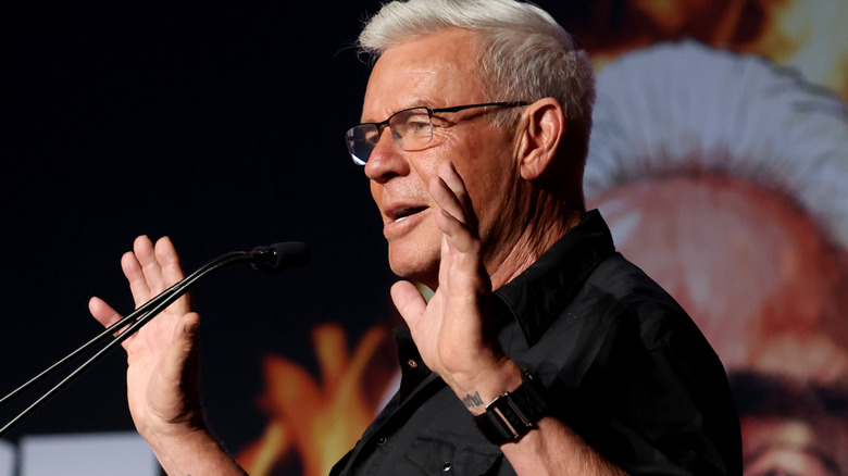 Eric Bischoff puts up his hands
