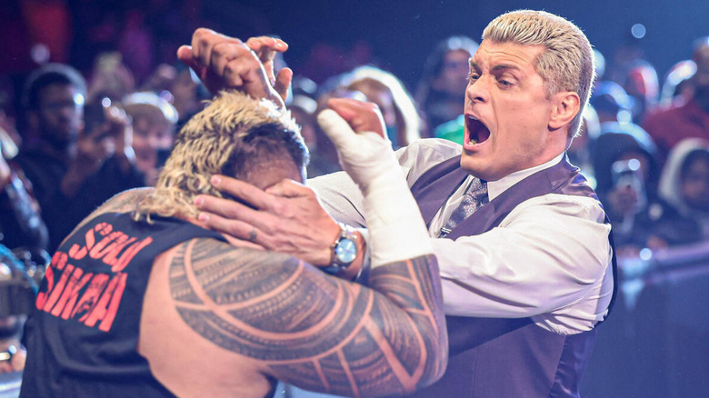 Solo Sikoa and Cody Rhodes brawling