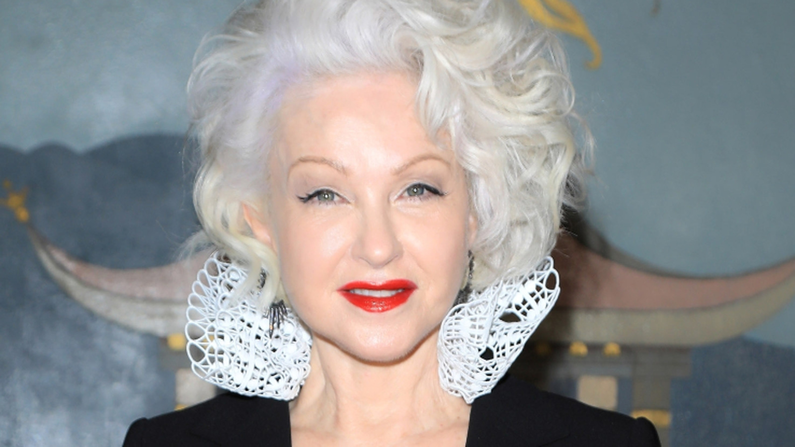 Why Former Women's Champion Wants To See Pop Star Cyndi Lauper In WWE Hall Of Fame