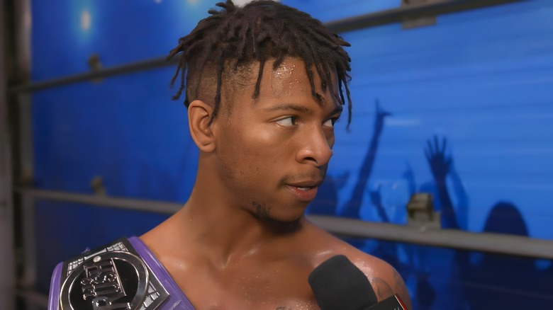 Lio Rush looking serious