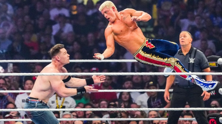 Cody Rhodes bounces off the ropes to hit a Cody Cutter on John Cena in the middle of the ring during their WrestleMania 41 match.