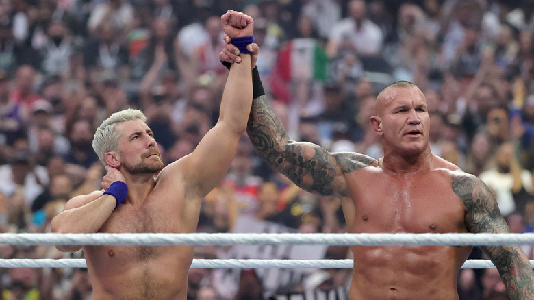 Randy Orton raises Joe Hendry's hand