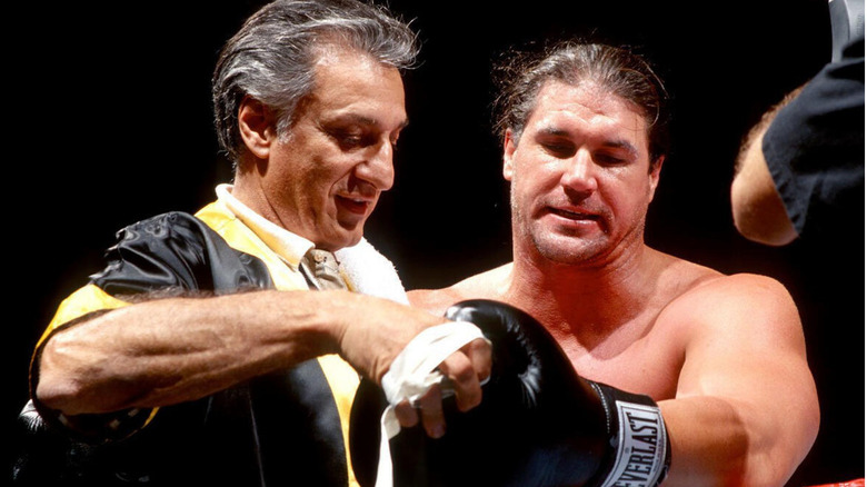 Referee and Bart Gunn, winner of the Brawl For All