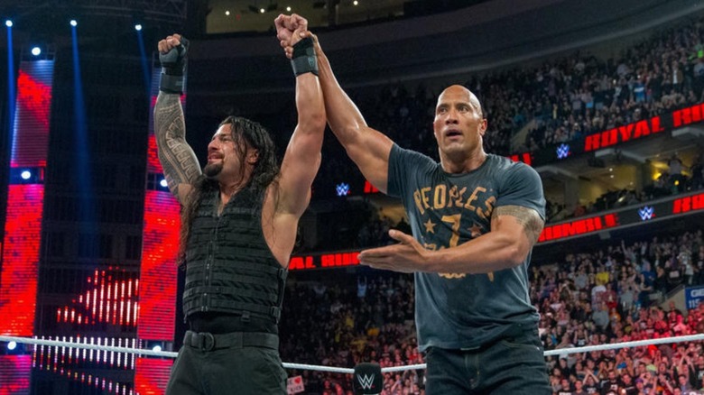 Roman Reigns and The Rock, experiencing a moment together