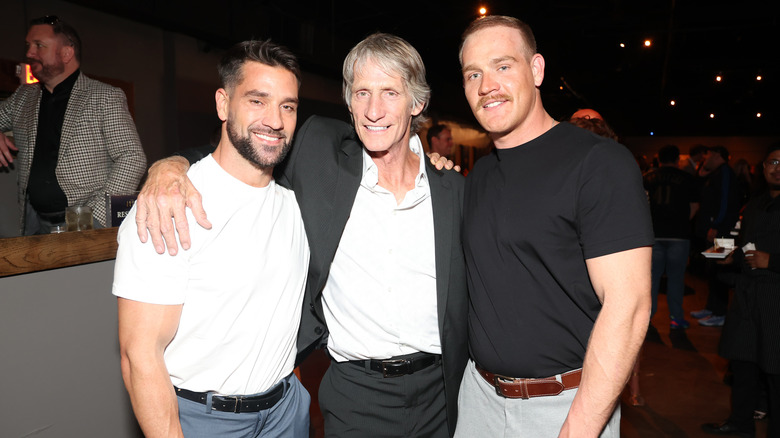 Kevin Von Erich poses with his sons