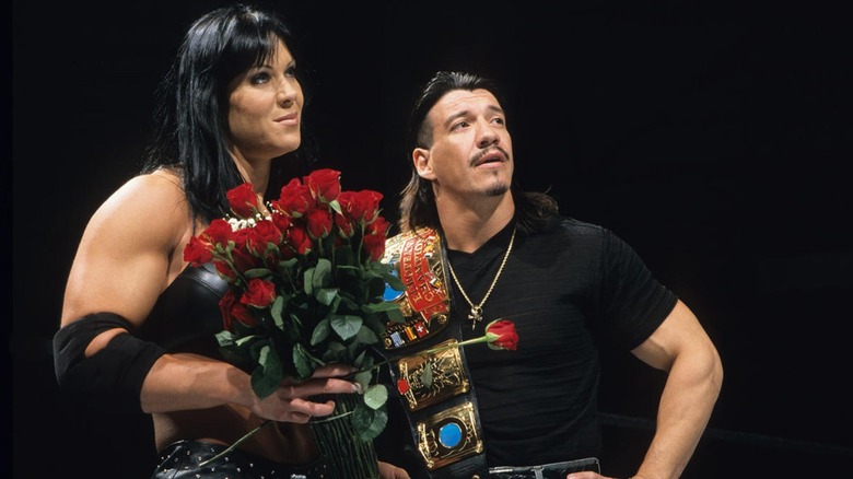 Chyna and Eddie Guerrero look on 