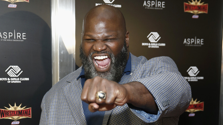Mark Henry posing at a press event 