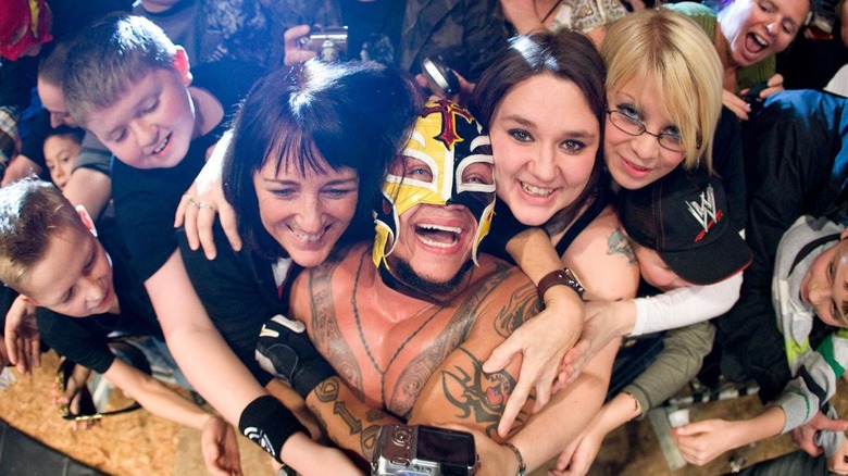 Rey Mysterio Embraces Fans At A WWE Live Event