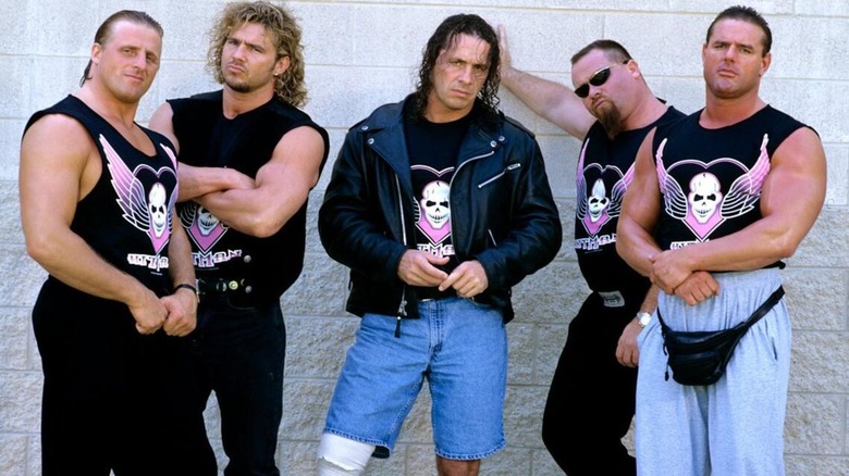 Owen Hart, Brian Pillman, Bret Hart, Jim Neidhart, and Davey-Boy Smith posing together as the Hart Foundation.