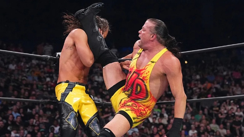 Rob Van Dam delivers a spinning kick in AEW