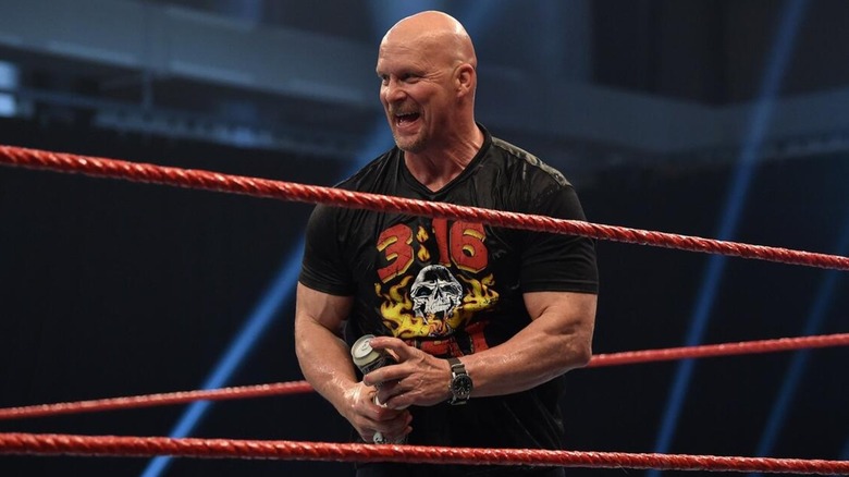 Stone Cold Steve Austin smiling in the ring