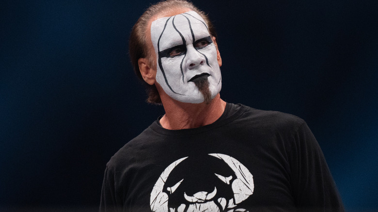 Sting wearing black and white facepaint