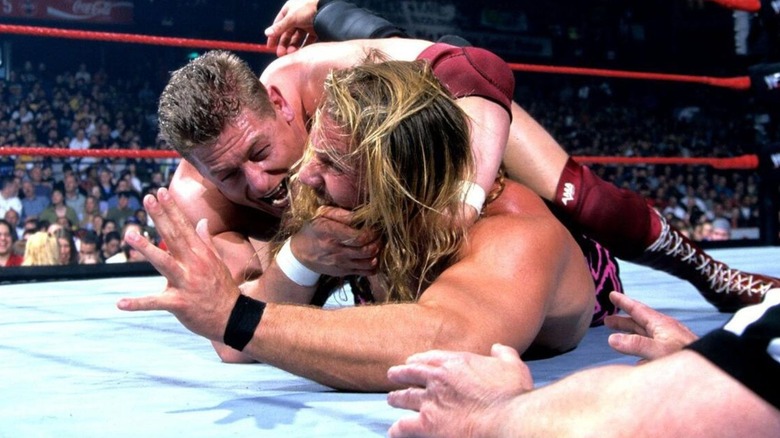 William Regal puts Chris Jericho in a submission hold in the middle of the ring during their Duchess of Queensbury Match at Backlash 2001.