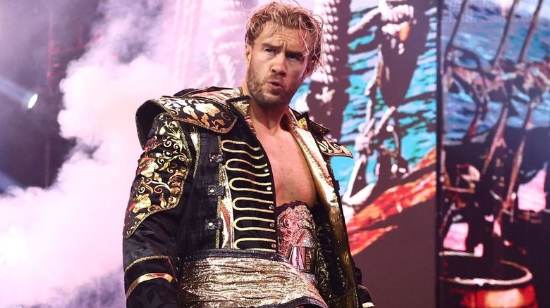 Will Ospreay wearing the AEW World Championship around his waist