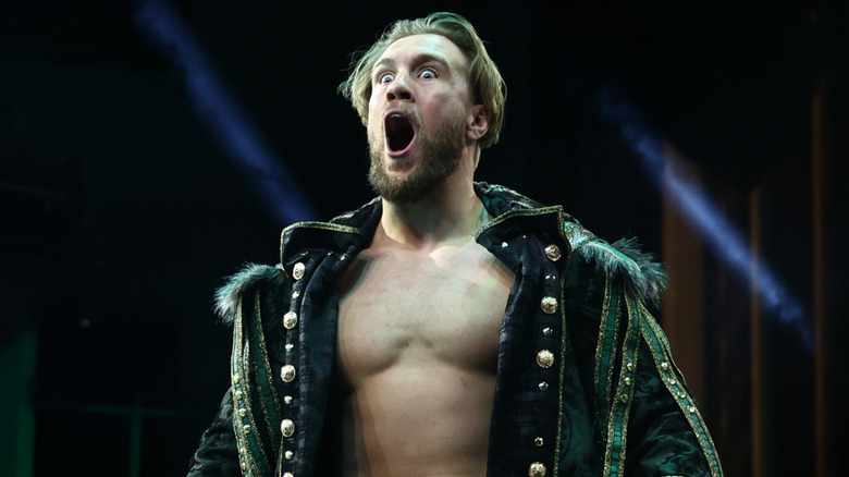 Will Ospreay with his mouth agape while walking to the ring
