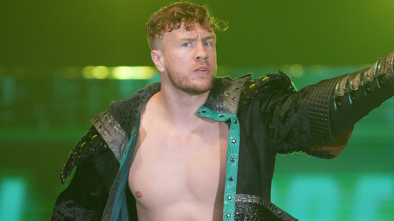 Will Ospreay wearing a black ring jacket