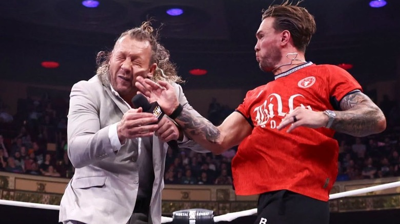 Will Ospreay connects a nasty slap across AEW World Champion Kenny Omega's face during one of their face-to-face confrontations
