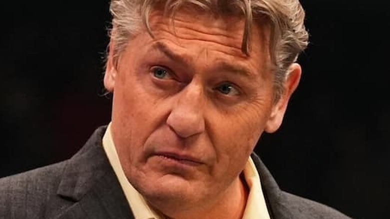 William Regal posing