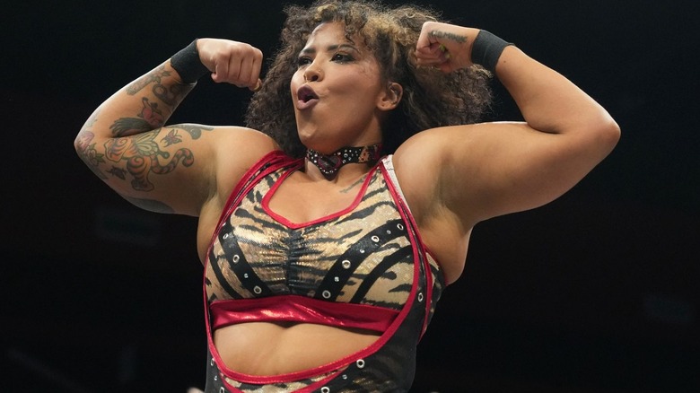 Willow Nightingale flexes and hoots.