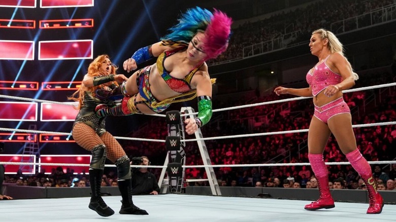 Becky Lynch, Asuka, and Charlotte Flair at WWE TLC 2018