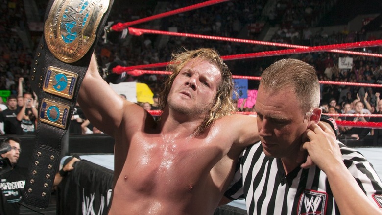 Chris Jericho holding the Intercontinental Championship at WWE Unforgiven 2004