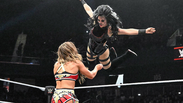 Stephanie Vaquer diving onto Fallon Henley