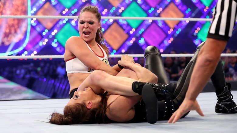 Ronda Rousey traps Stephanie McMahon in an armbar