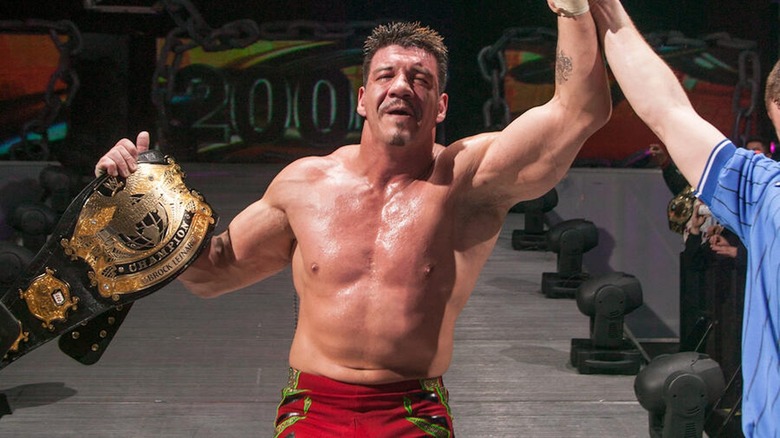 Eddie Guerrero celebrates winning the WWE Championship.