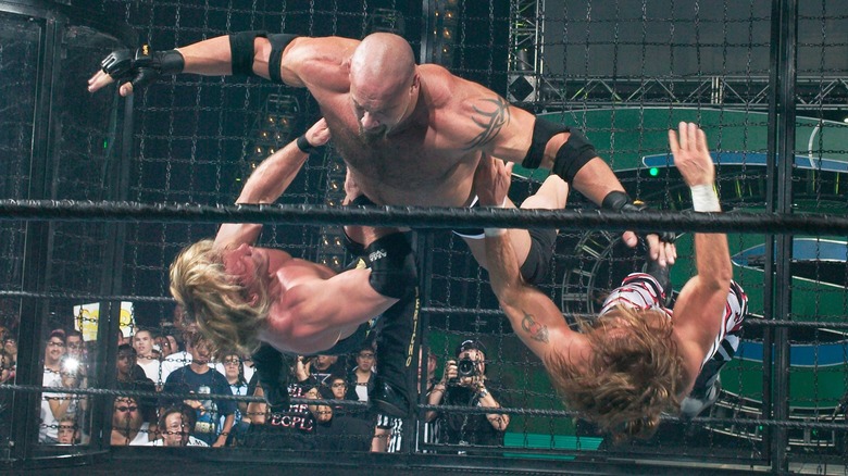 Goldberg wrestles Shawn Michaels and Chris Jericho