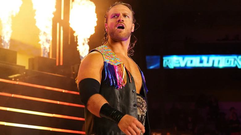 "Hangman" Adam Page wearing a leather vest