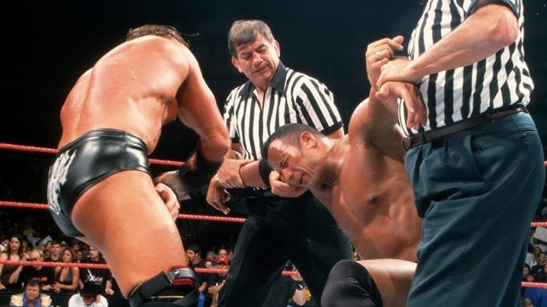 Triple H, Gerald Brisco, The Rock, and Pat Patterson at WWE Backlash 2000