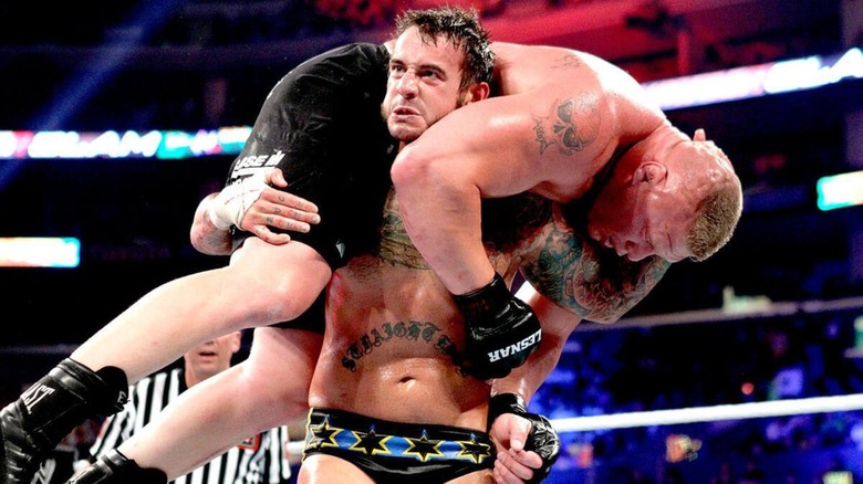 CM Punk wrestles Brock Lesnar