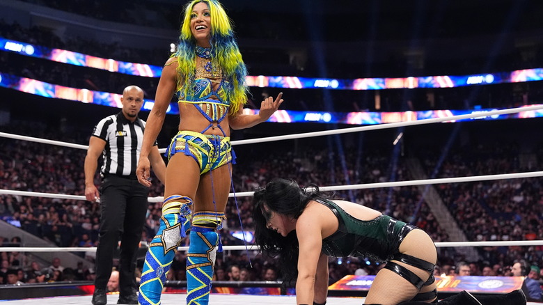 Mercedes Mone stands over Stephanie Vaquer in the ring during their match at AEW x NJPW x CMLL Forbidden Door.