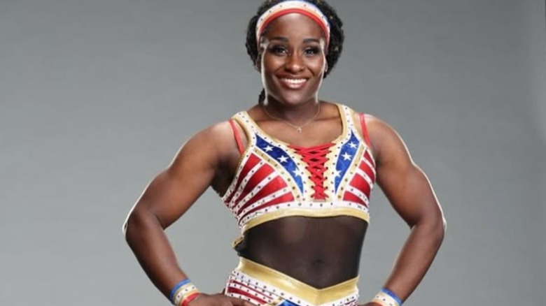 Tyra Mae Steele poses in her ring gear backstage for a WWE photoshoot in an image posted to her Instagram account.