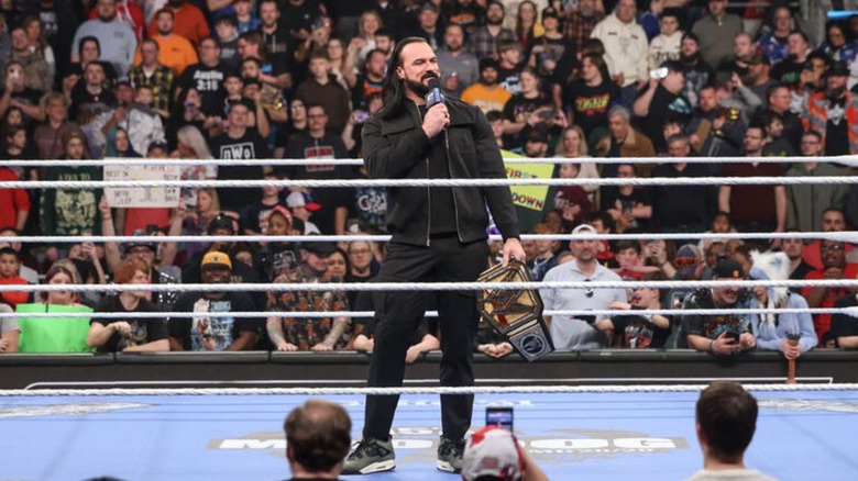 Undisputed WWE Champion Drew McIntyre cuts a promo in the ring during an episode of 