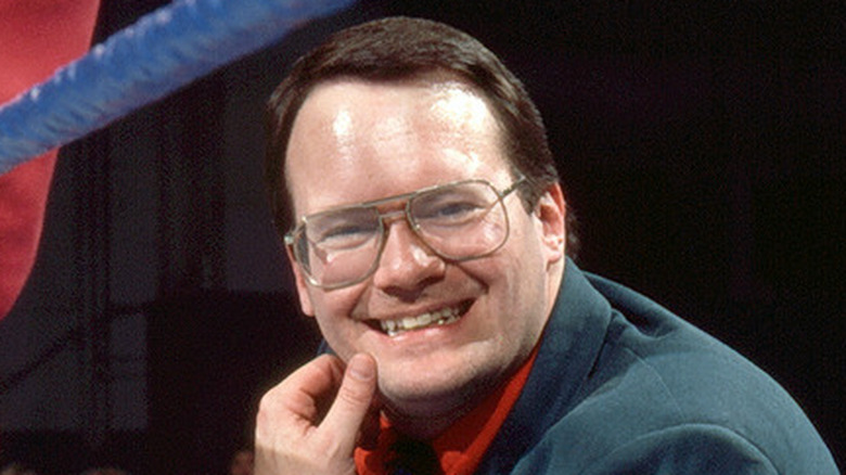 Jim Cornette smiles for the camera while leaning on the outside of the ring in a photo posted to WWE.com.