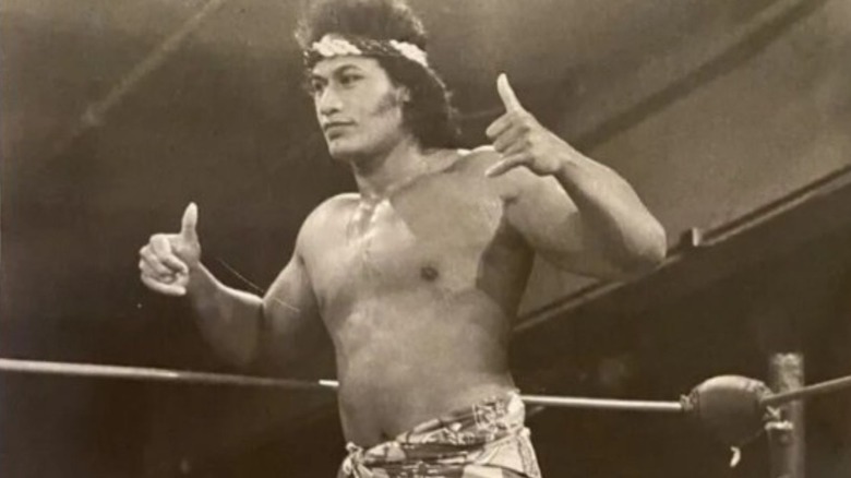 Siva Afi poses in the ring, in the corner ahead of a match, in an old photo