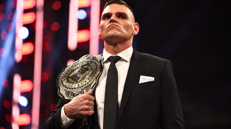 Gunther holding the WWE Intercontinental Championship